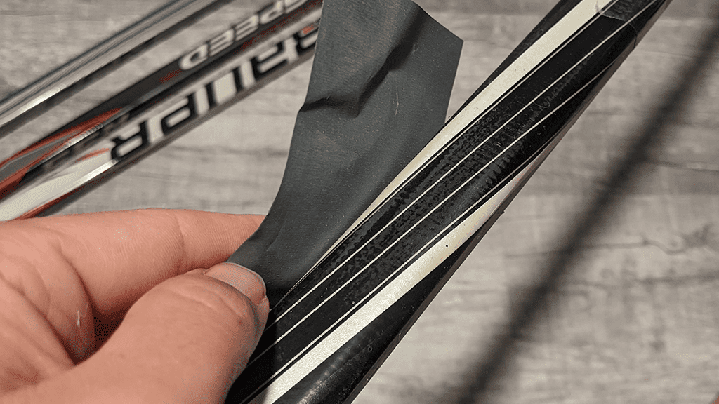SANDING-IS-AN-EFFECTIVE-METHOD-OF-REMOVING-GRIP-COATING-FROM-HOCKEY-STICK
